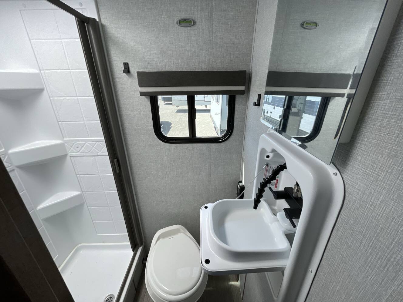 A photo of this 2023 Grand Design IMAGINE AIM 18BH