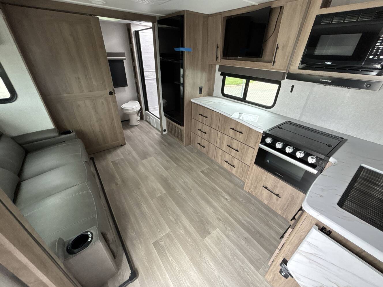 A photo of this 2024 Grand Design IMAGINE XLS 22RBE