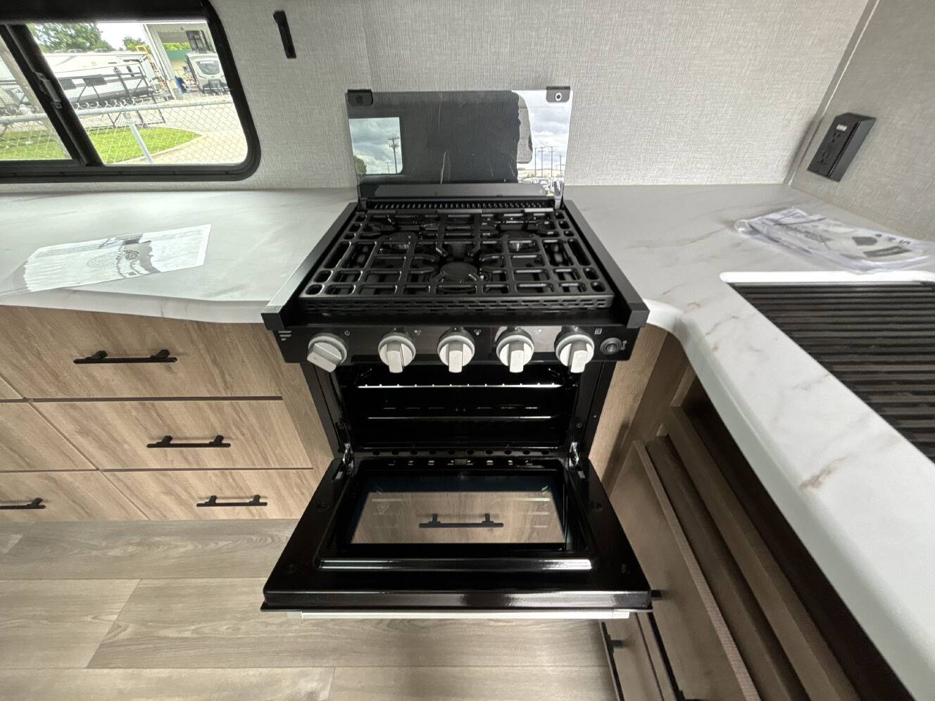 A photo of this 2024 Grand Design IMAGINE XLS 22RBE