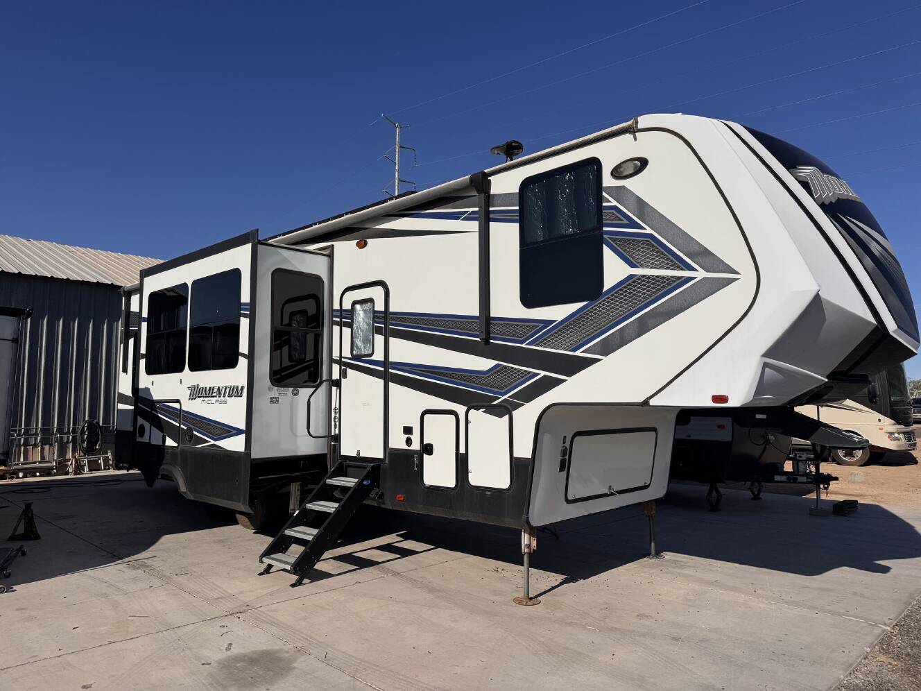 A photo of this 2019 Grand Design Momentum M-CLASS 328M