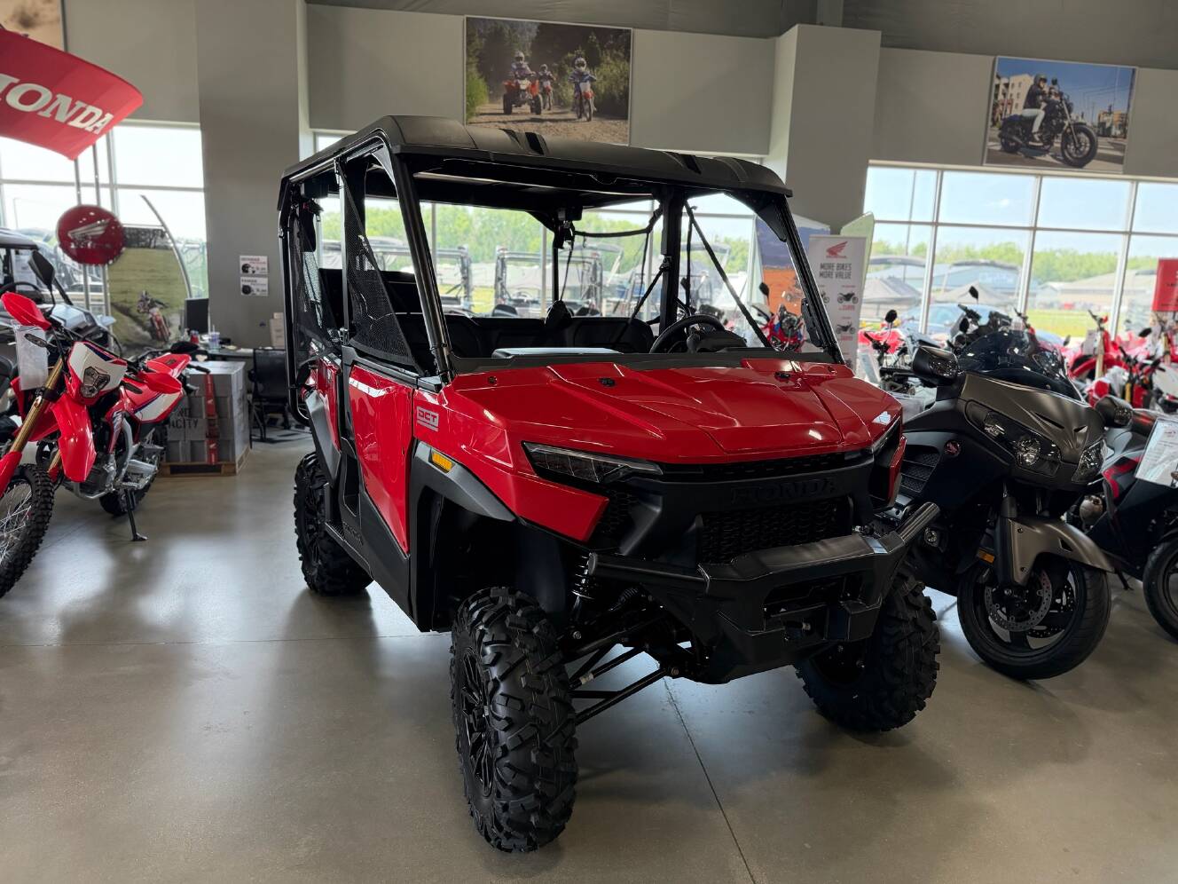 A photo of this 2026 Honda Pioneer 1000-5 Deluxe