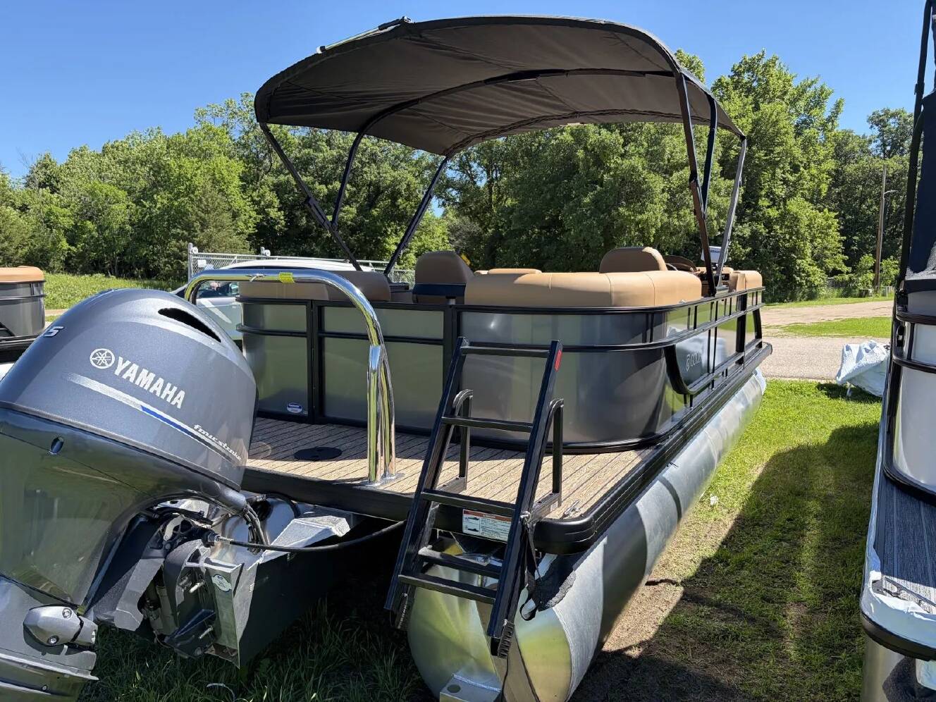 A photo of this 2027 Godfrey XPERIENCE 2286 SBX 115HP BUNK TRAILER