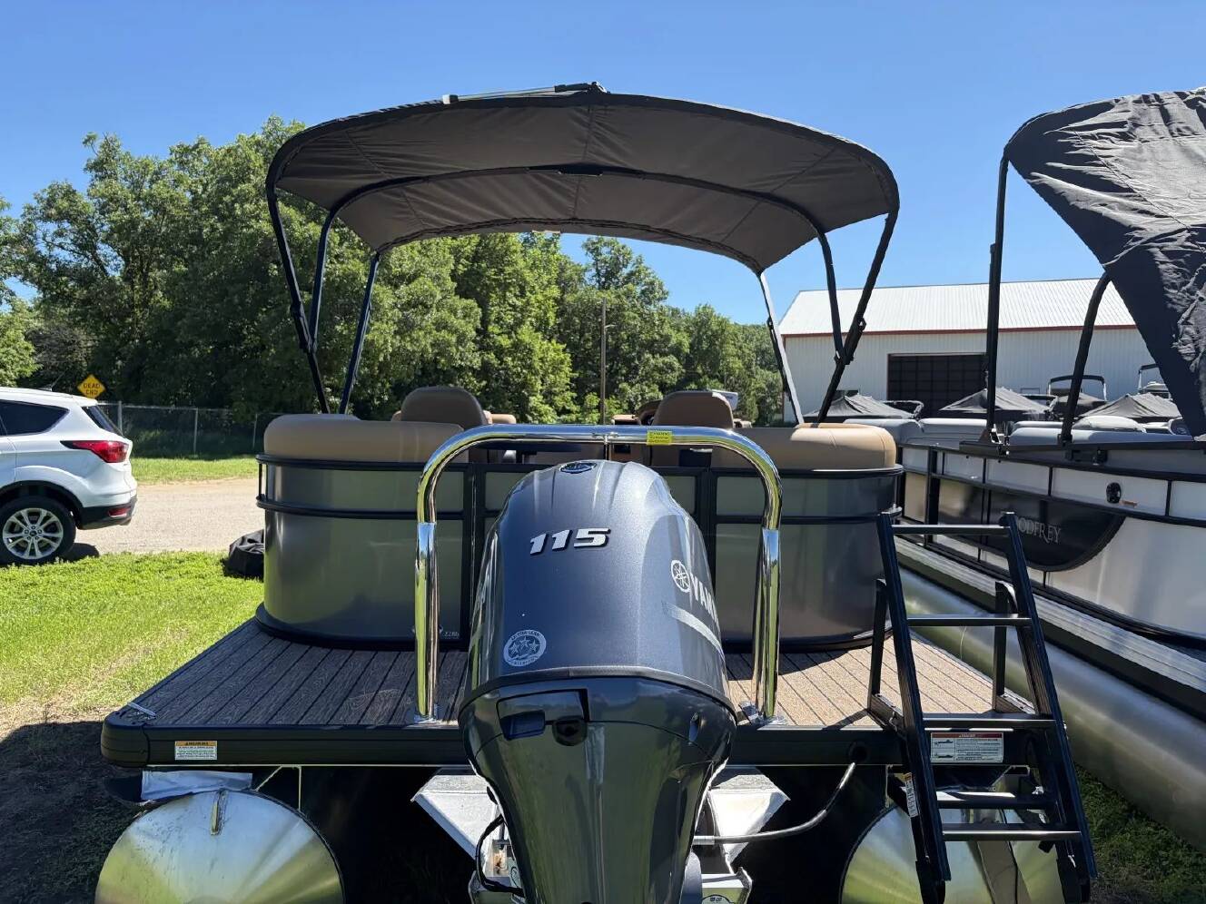 A photo of this 2027 Godfrey XPERIENCE 2286 SBX 115HP BUNK TRAILER