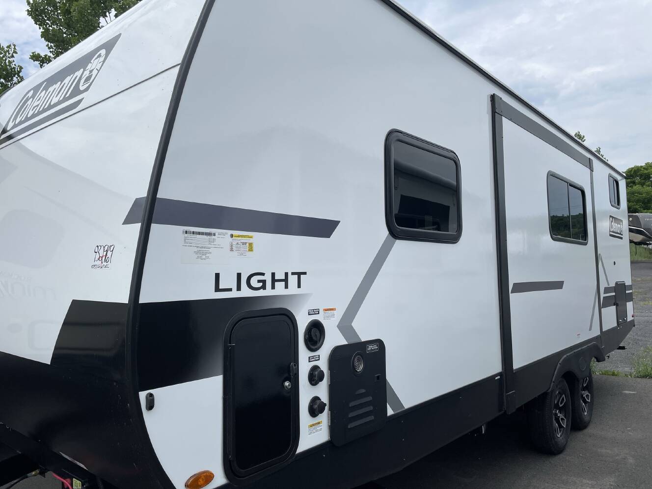 A photo of this 2027 Keystone COLEMAN LIGHT 22BX