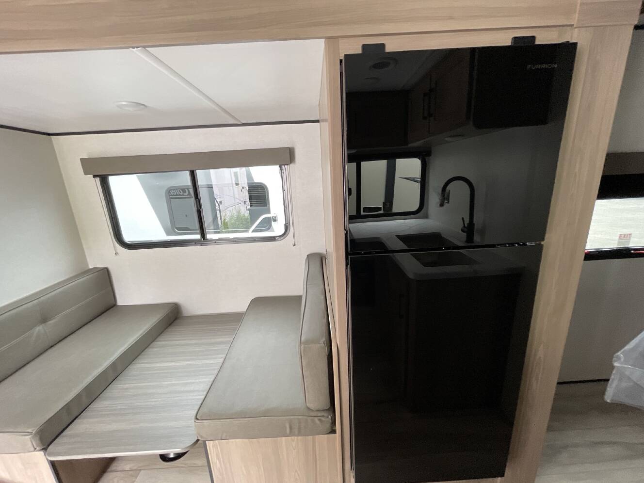 A photo of this 2027 Keystone COLEMAN LIGHT 22BX