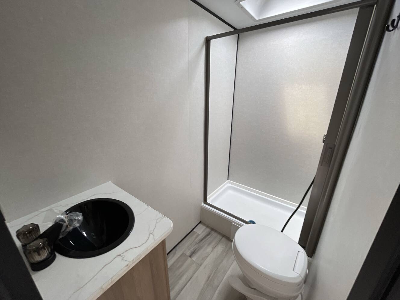 A photo of this 2027 Keystone COLEMAN LIGHT 22BX