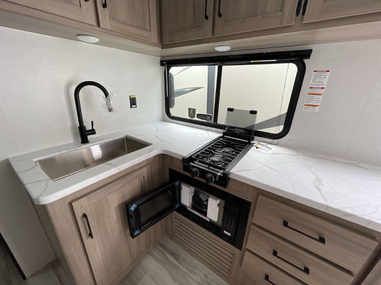 A photo of this 2027 Keystone COLEMAN LIGHT 22BX