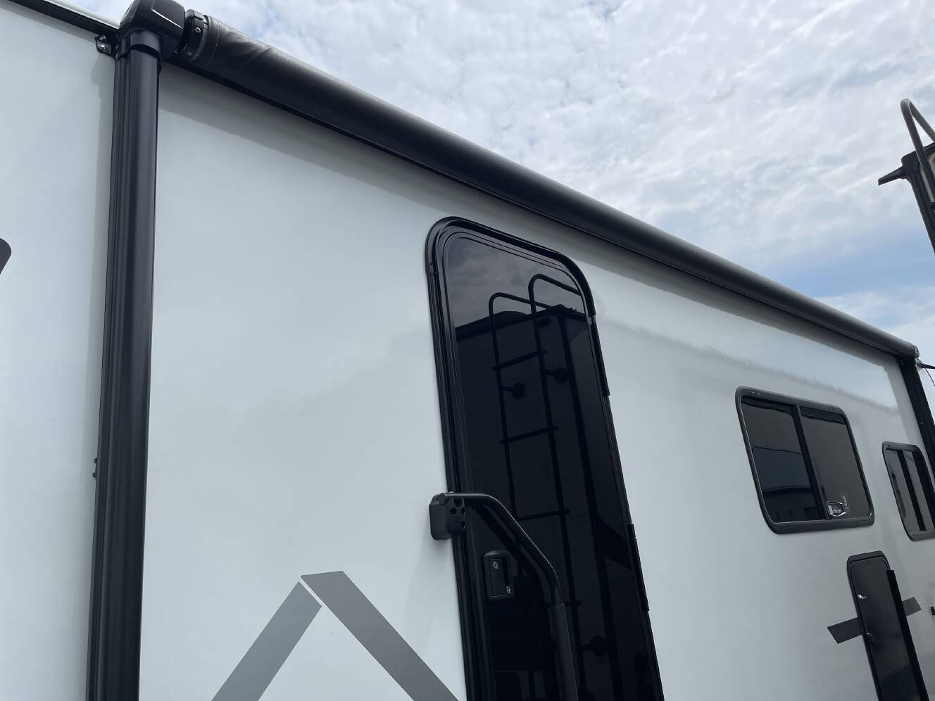 A photo of this 2027 Keystone COLEMAN LIGHT 22BX