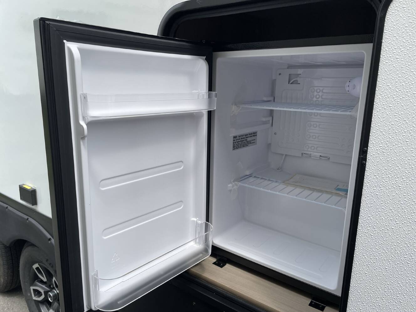 A photo of this 2027 Keystone COLEMAN LIGHT 22BX