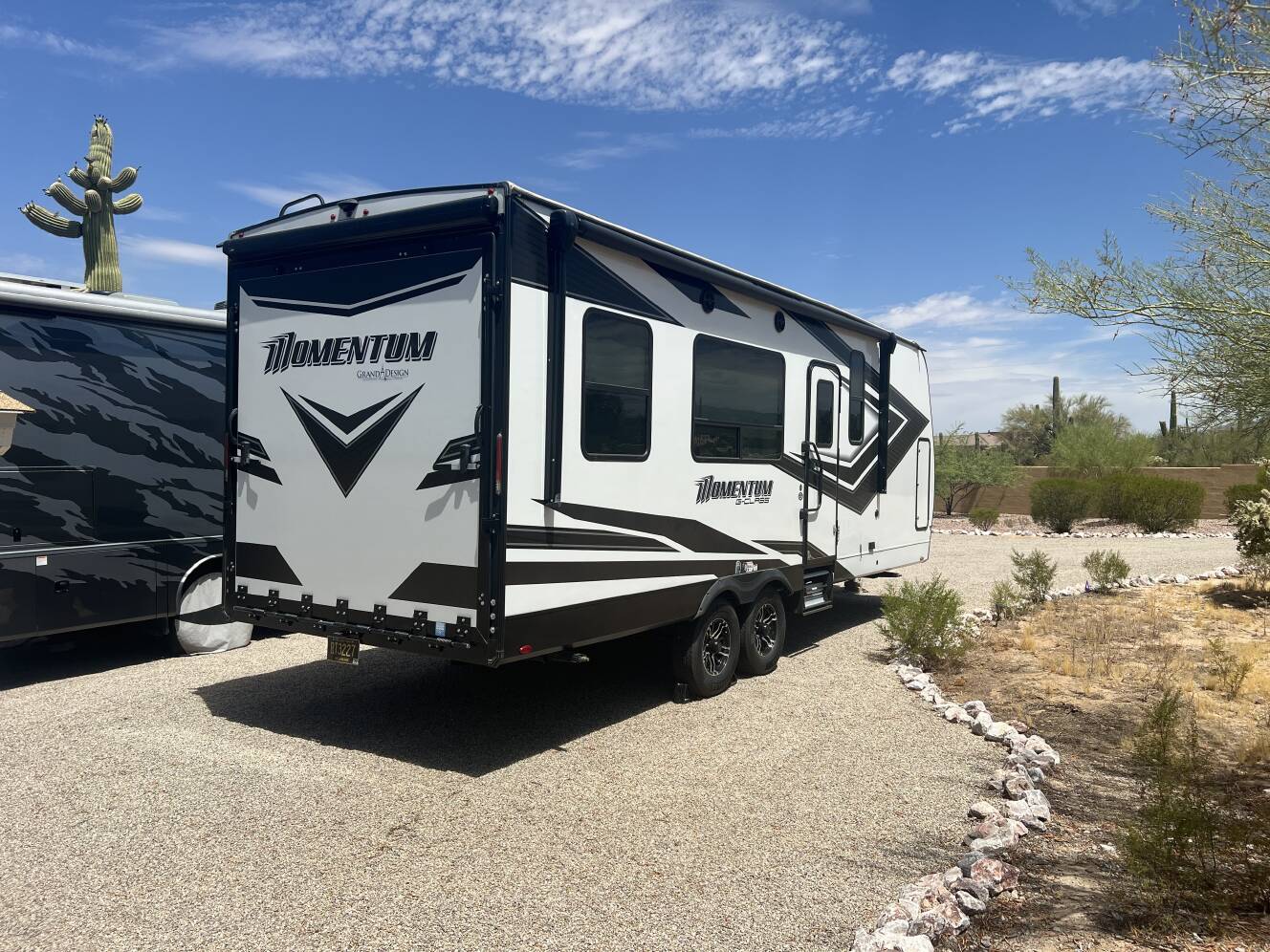 A photo of this 2022 Grand Design MOMENTUM G-CLASS 23G