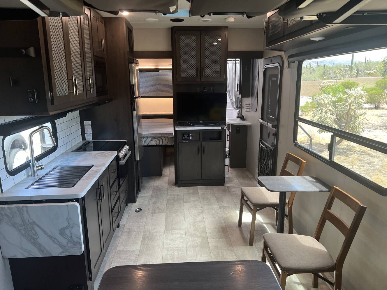 A photo of this 2022 Grand Design MOMENTUM G-CLASS 23G
