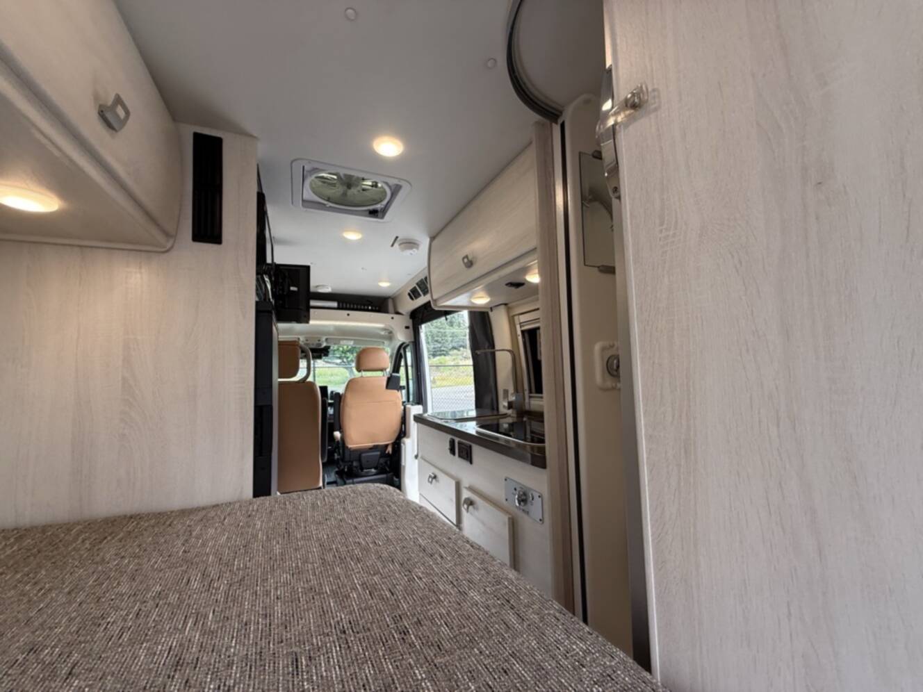A photo of this 2025 Winnebago TRAVATO 59G