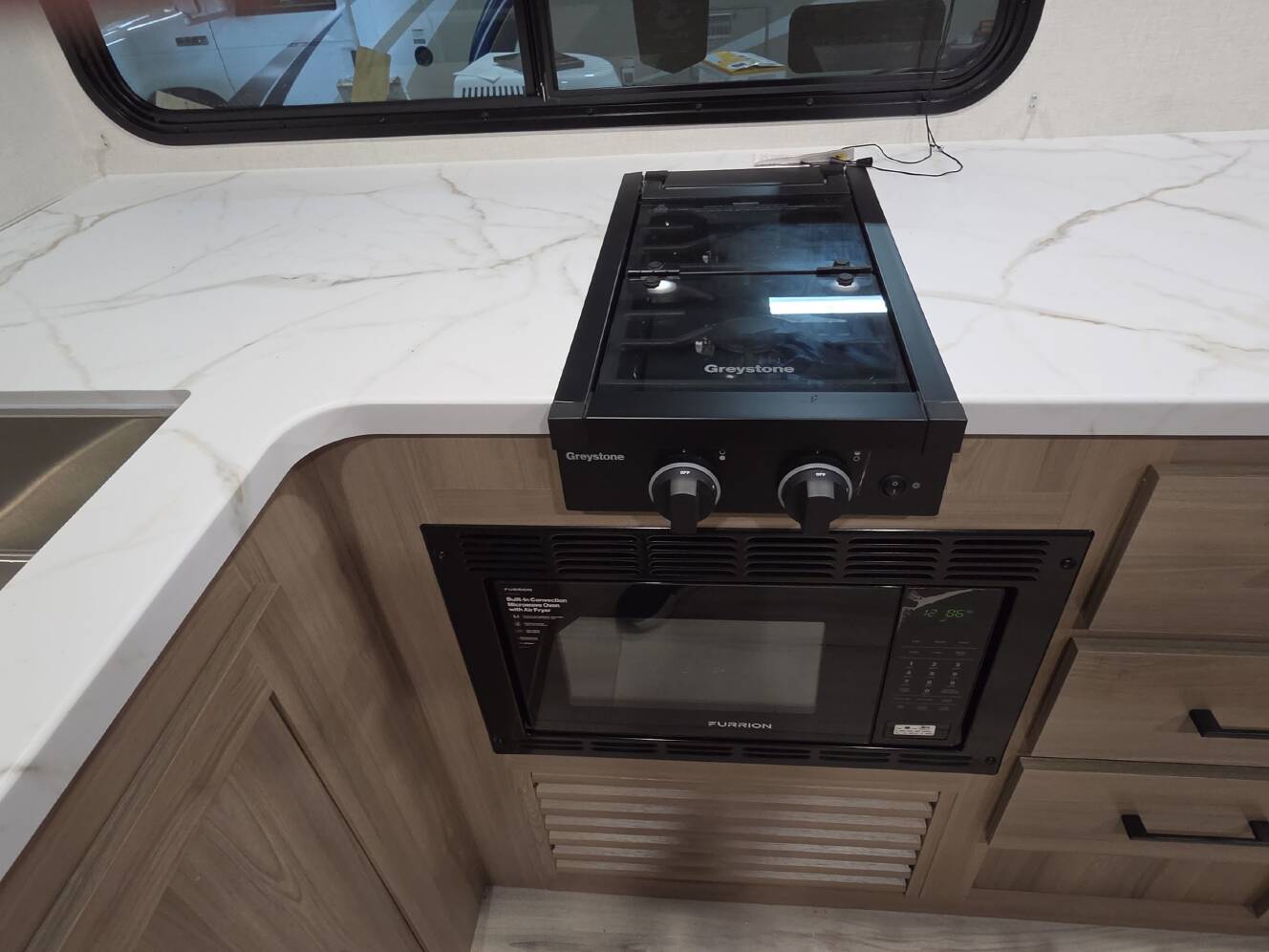 A photo of this 2027 Keystone COLEMAN LIGHT 22BX