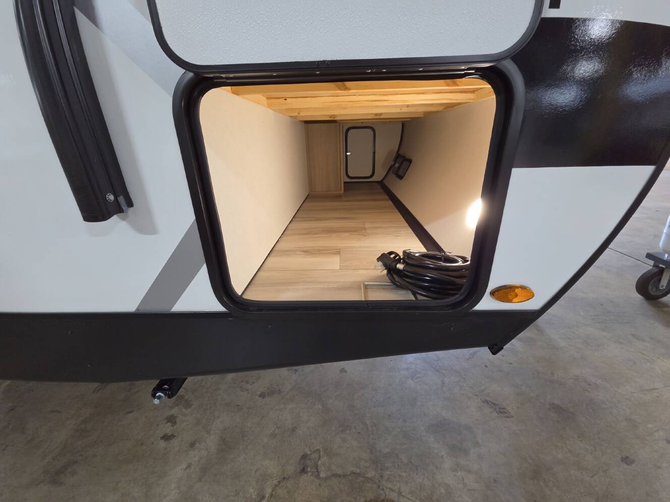 A photo of this 2027 Keystone COLEMAN LIGHT 22BX