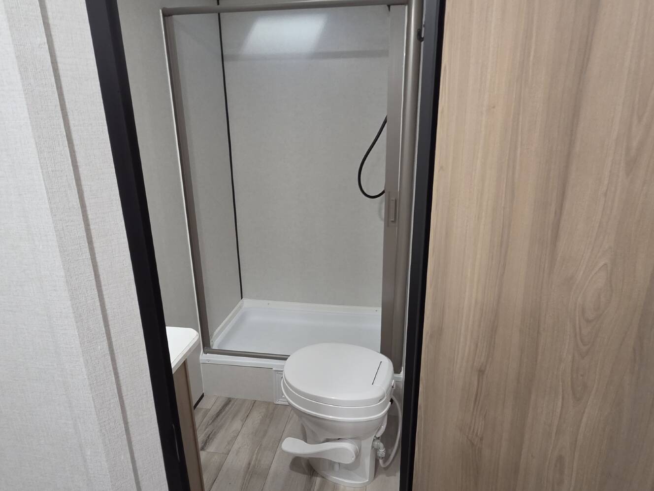 A photo of this 2027 Keystone COLEMAN LIGHT 22BX