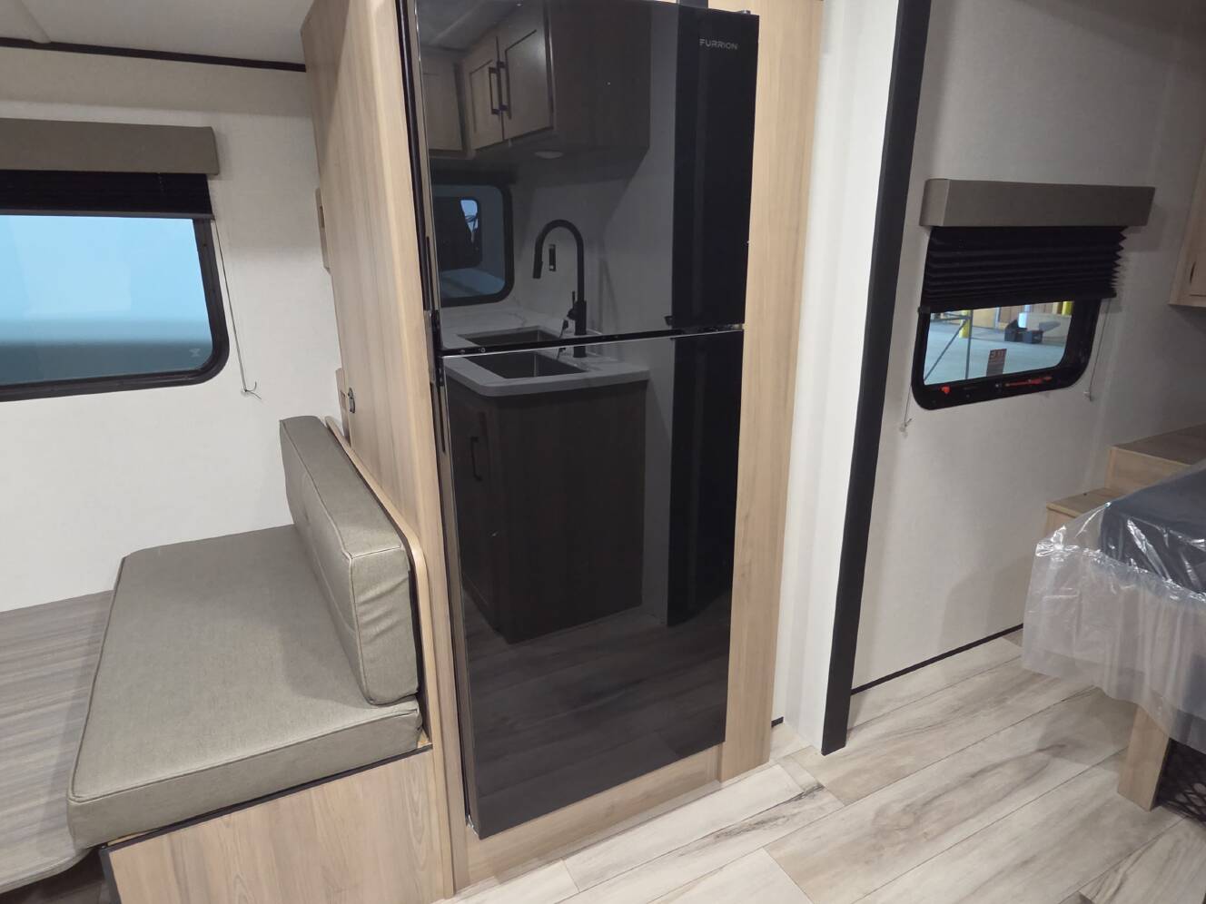 A photo of this 2027 Keystone COLEMAN LIGHT 22BX