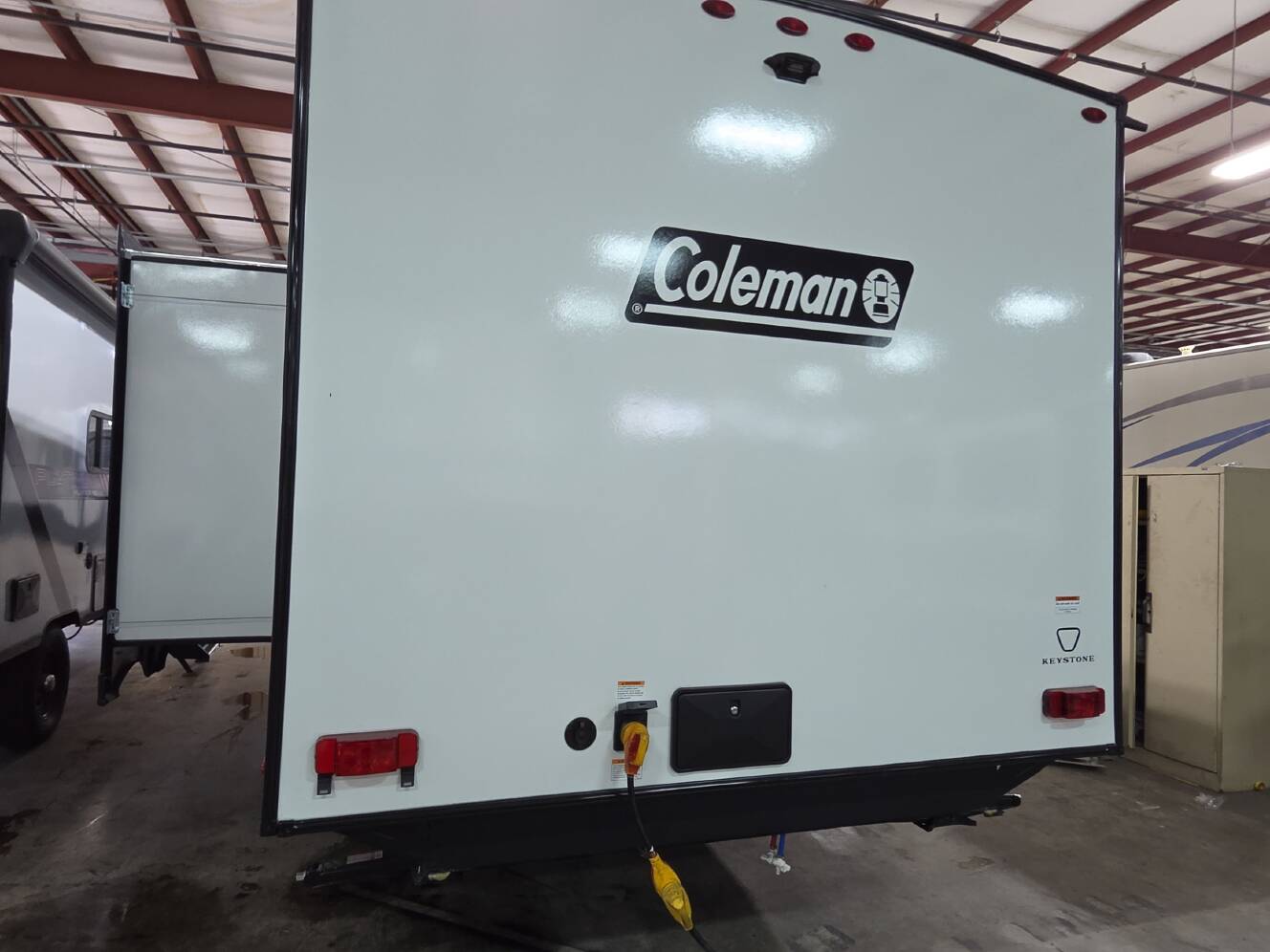 A photo of this 2027 Keystone COLEMAN LIGHT 22BX
