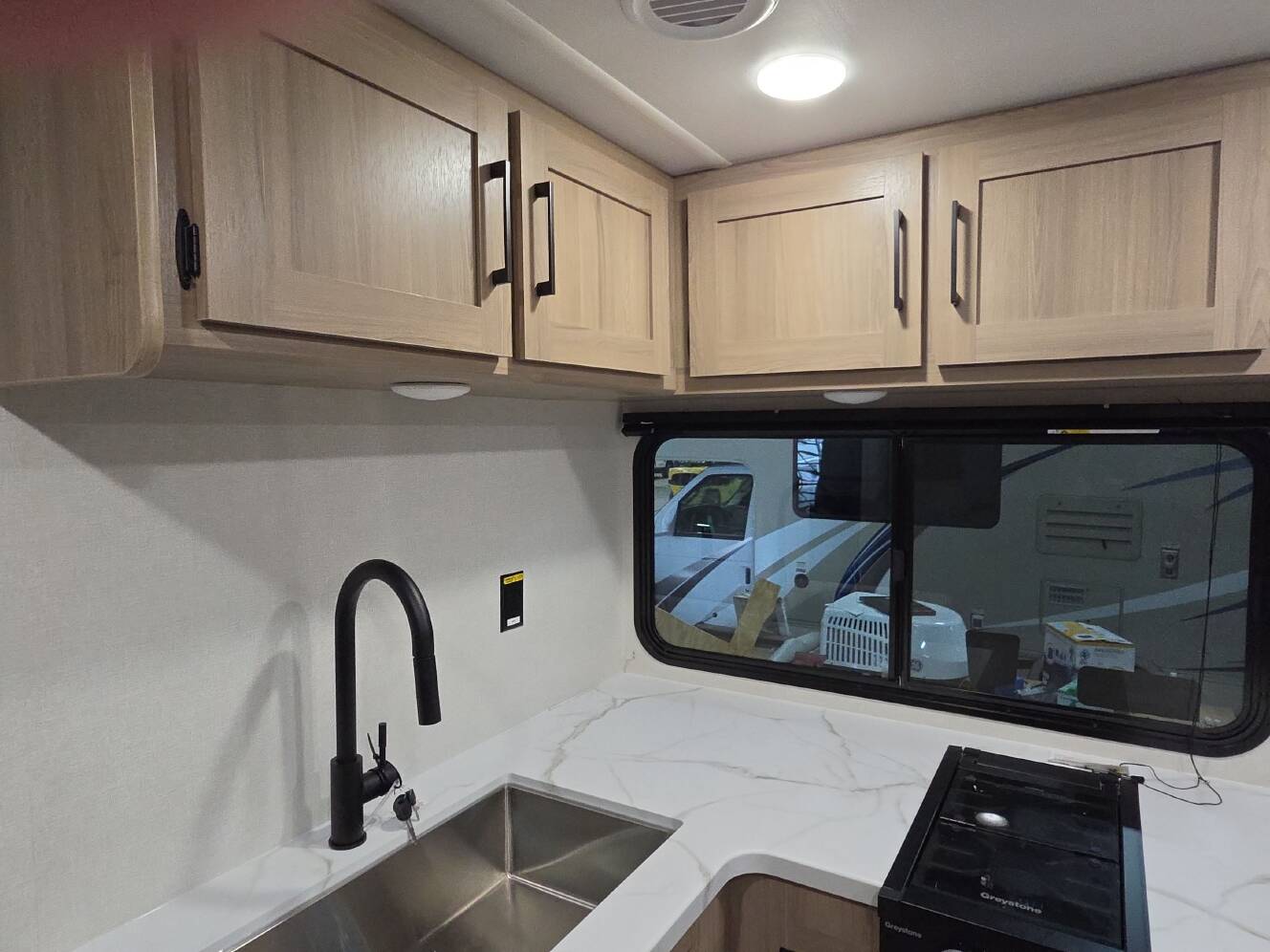 A photo of this 2027 Keystone COLEMAN LIGHT 22BX