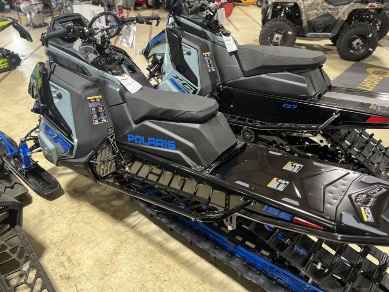 A photo of this 2026 Polaris® Patriot 9R RMK Khaos 155 Hemlock Blue / Black / Velocit