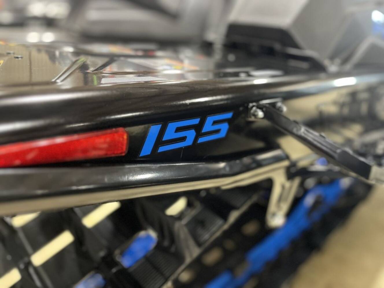 A photo of this 2026 Polaris® Patriot 9R RMK Khaos 155 Hemlock Blue / Black / Velocit