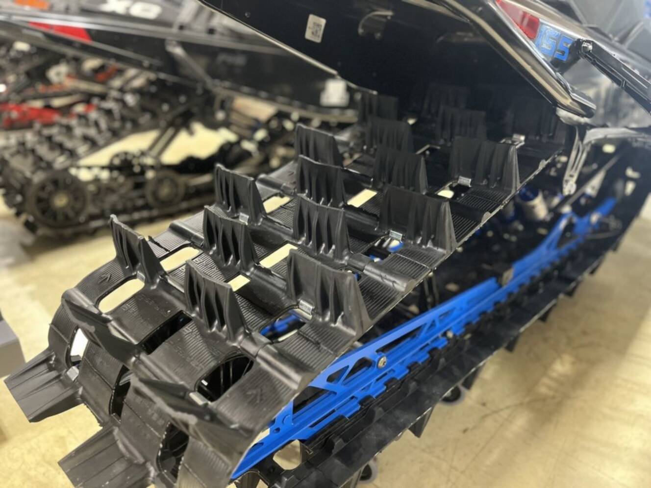 A photo of this 2026 Polaris® Patriot 9R RMK Khaos 155 Hemlock Blue / Black / Velocit