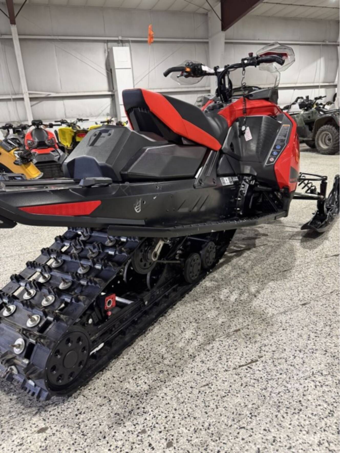 A photo of this 2021 Ski-Doo MXZ® TNT® Rotax® 850 E-TEC® Ripsaw 1.25 Lava Red