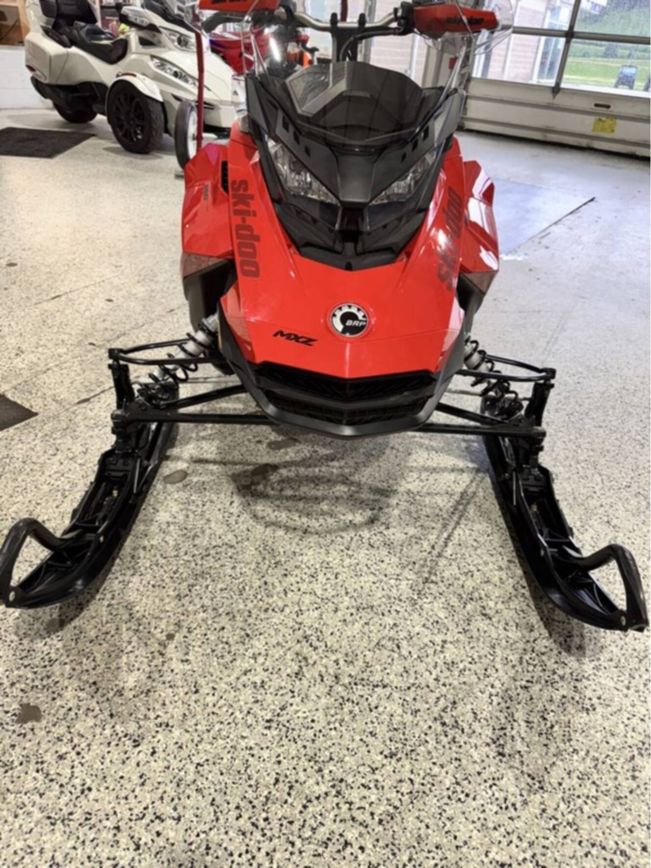 A photo of this 2021 Ski-Doo MXZ® TNT® Rotax® 850 E-TEC® Ripsaw 1.25 Lava Red