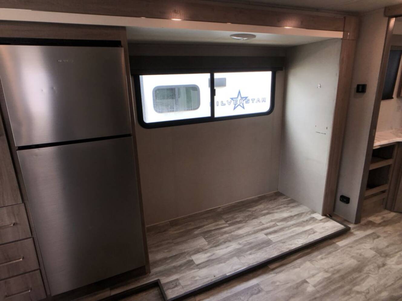 A photo of this 2022 Grand Design Imagine 23LDE