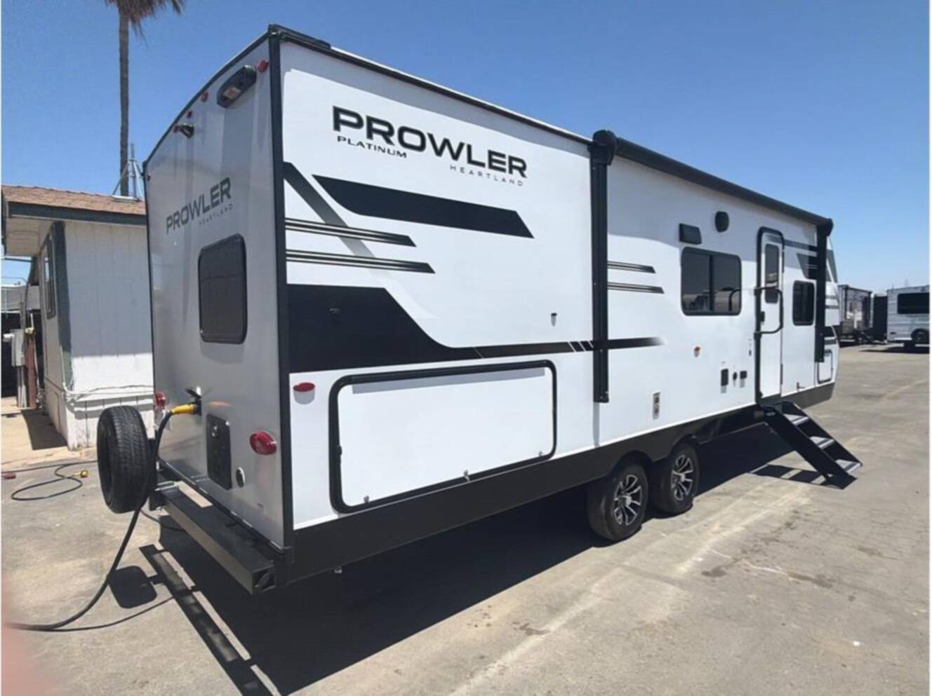 A photo of this 2027 Heartland Prowler 2602BHS Platinum