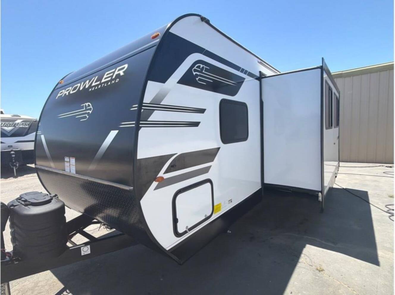 A photo of this 2027 Heartland Prowler 2602BHS Platinum