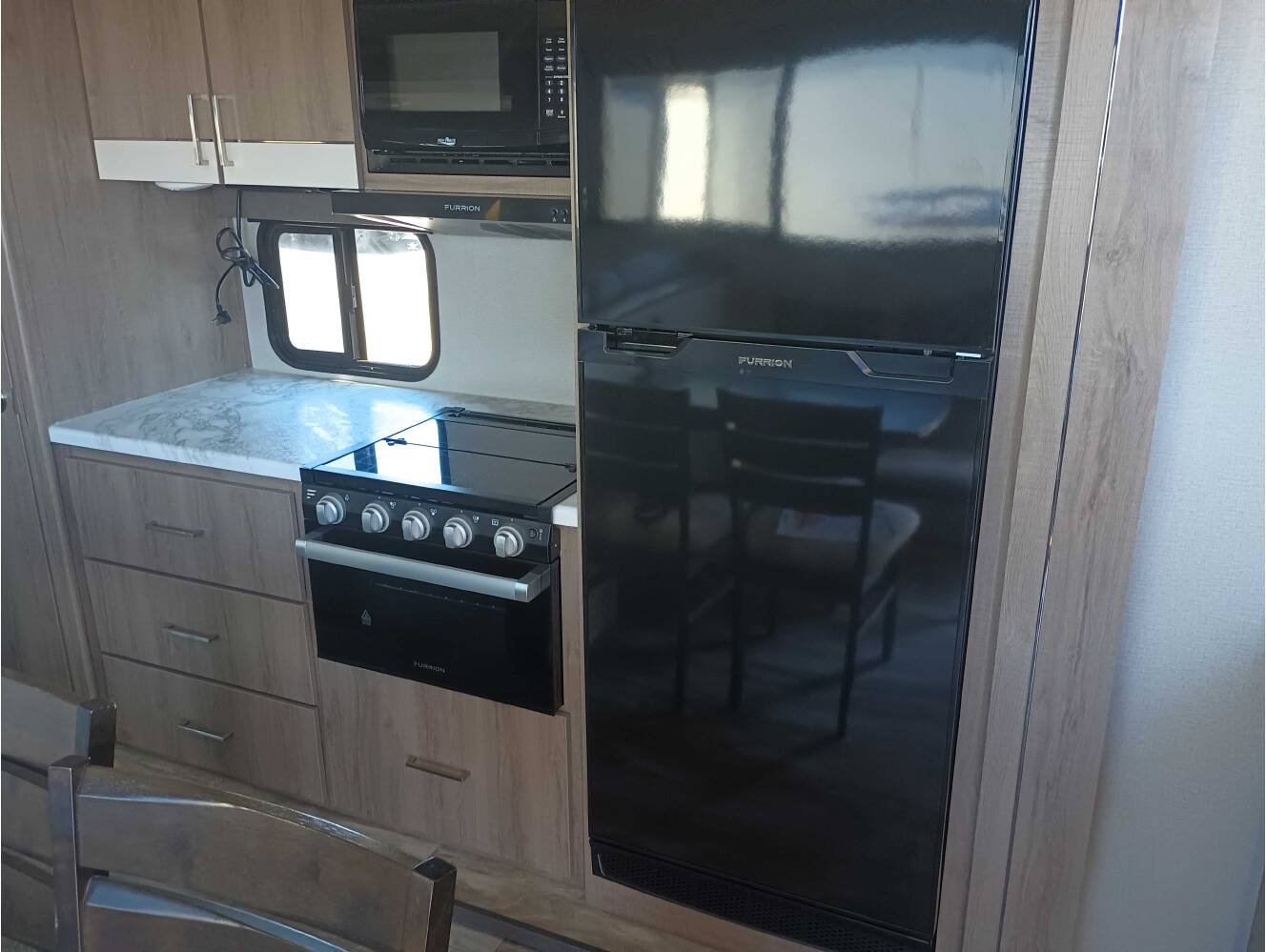 A photo of this 2022 Grand Design Imagine 3100RD