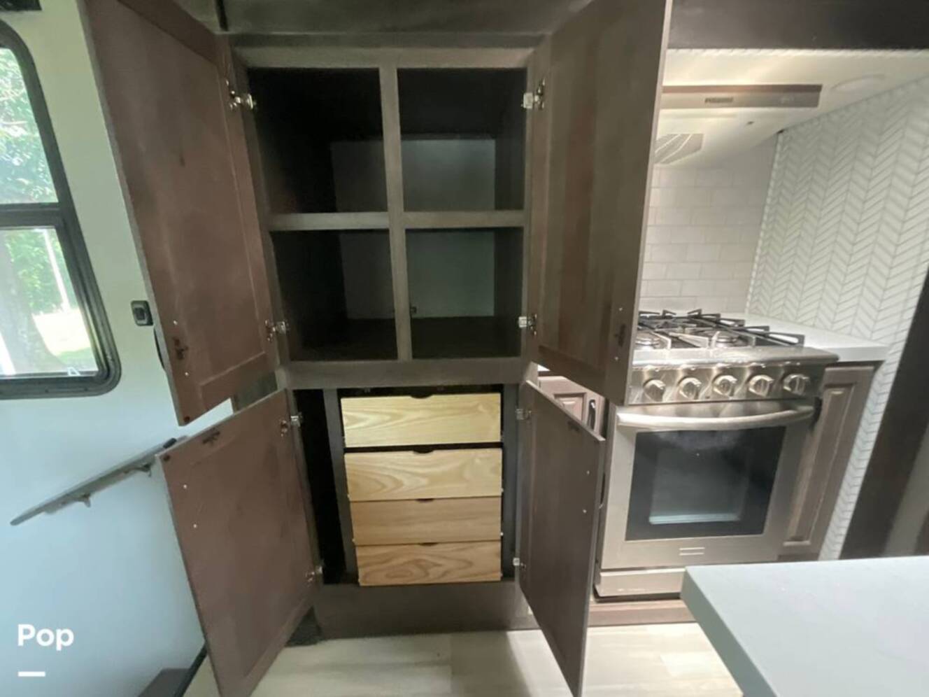 A photo of this 2022 Grand Design Solitude 390RK