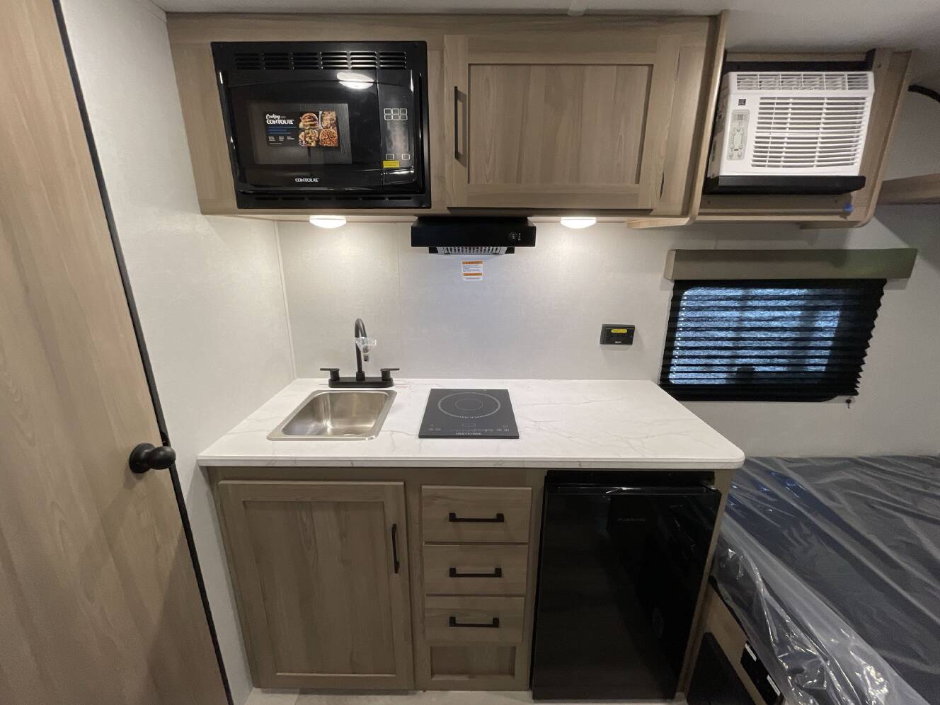 A photo of this 2027 Keystone COLEMAN 13R
