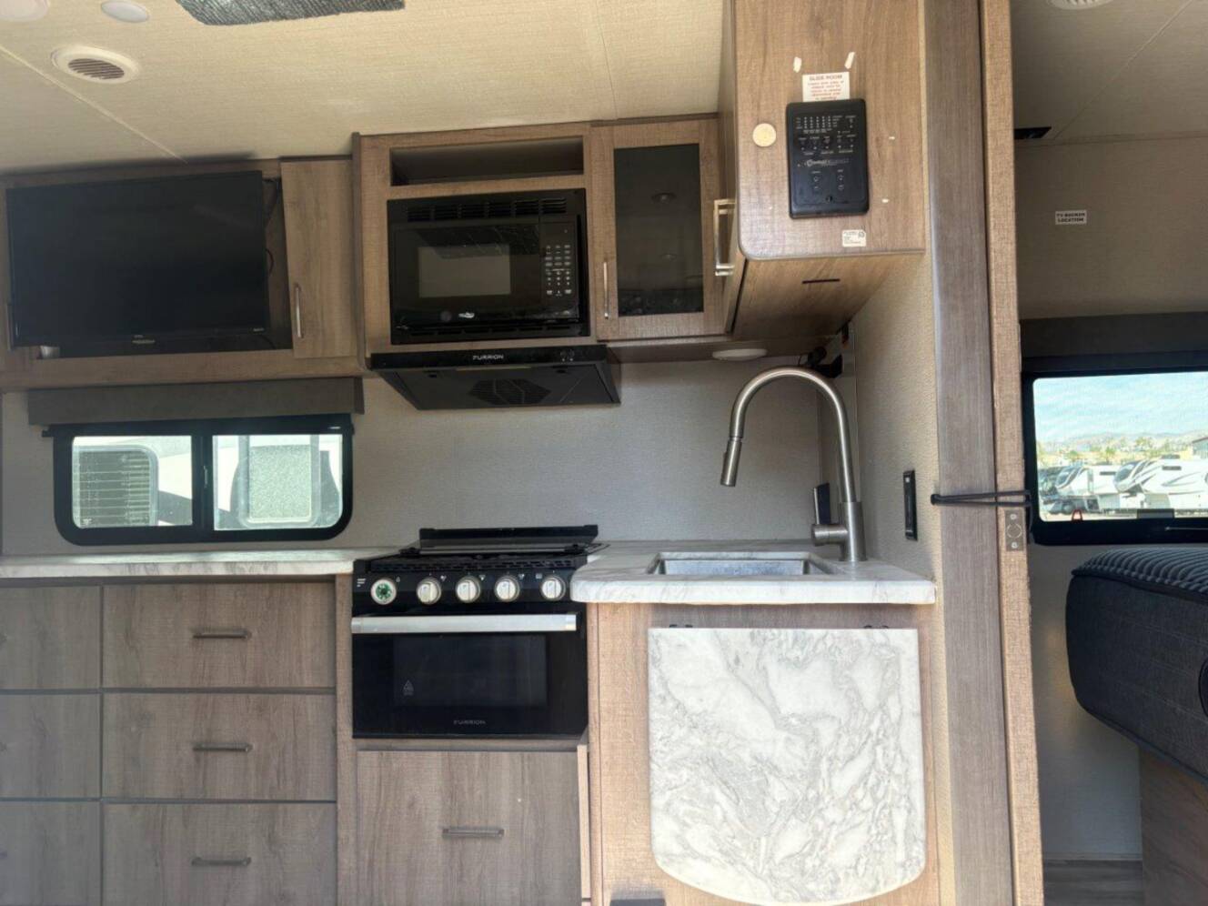 A photo of this 2022 Grand Design Imagine XLS 22RBE
