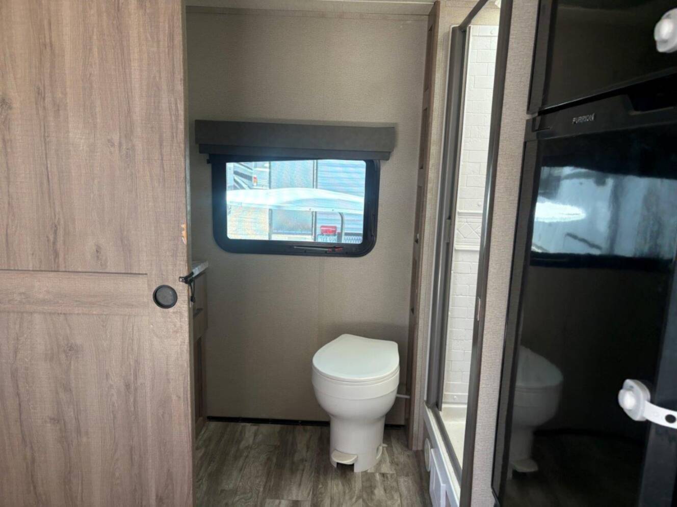 A photo of this 2022 Grand Design Imagine XLS 22RBE