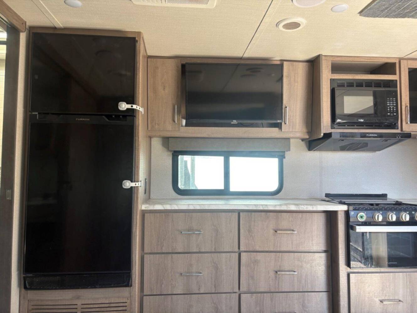 A photo of this 2022 Grand Design Imagine XLS 22RBE