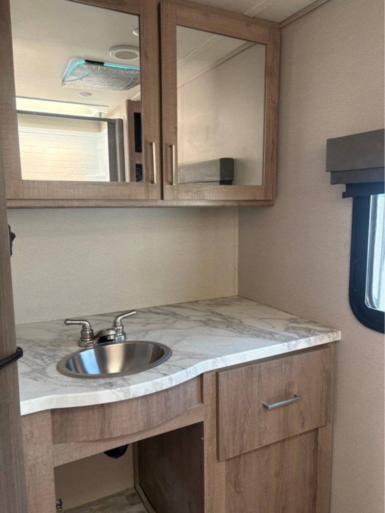 A photo of this 2022 Grand Design Imagine XLS 22RBE