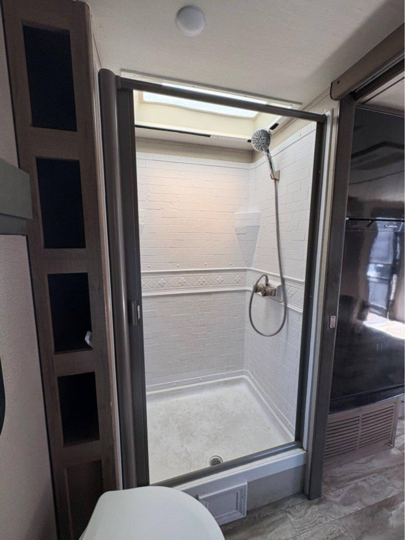 A photo of this 2022 Grand Design Imagine XLS 22RBE
