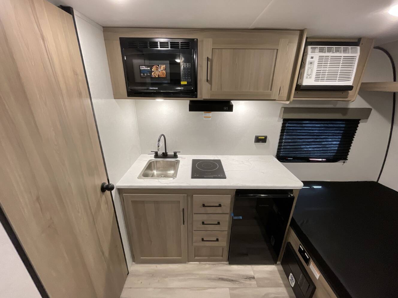 A photo of this 2027 Keystone COLEMAN 13R