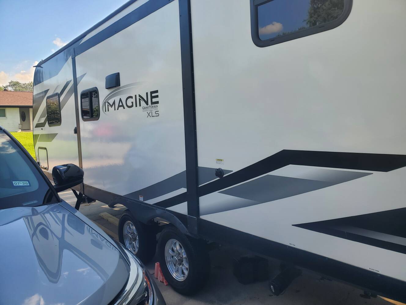A photo of this 2022 Grand Design IMAGINE XLS 23BHE