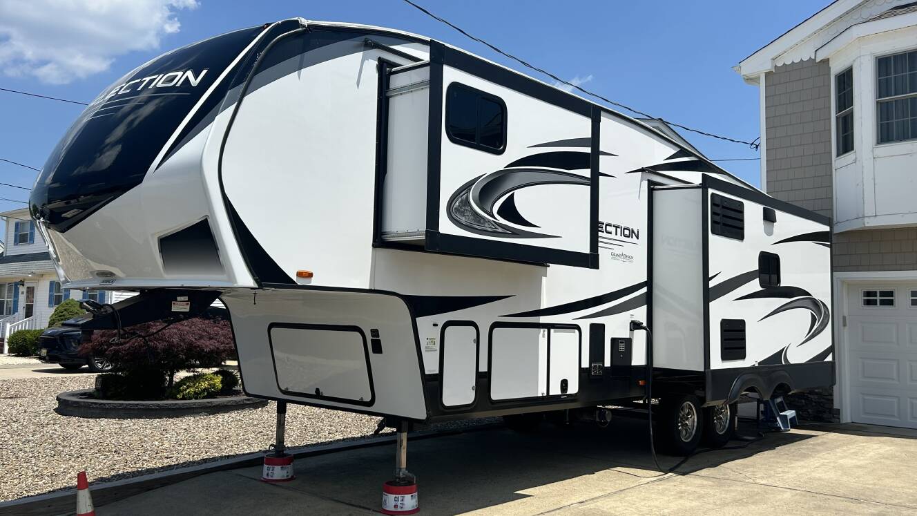 A photo of this 2021 Grand Design REFLECTION 303RLS