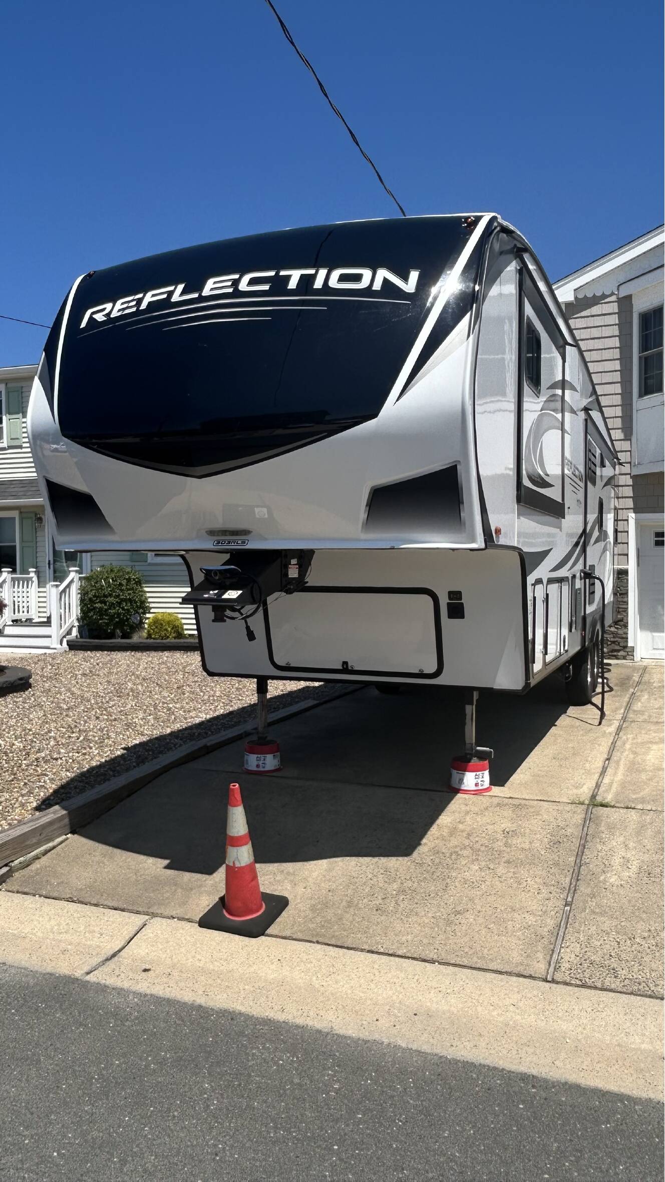 A photo of this 2021 Grand Design REFLECTION 303RLS