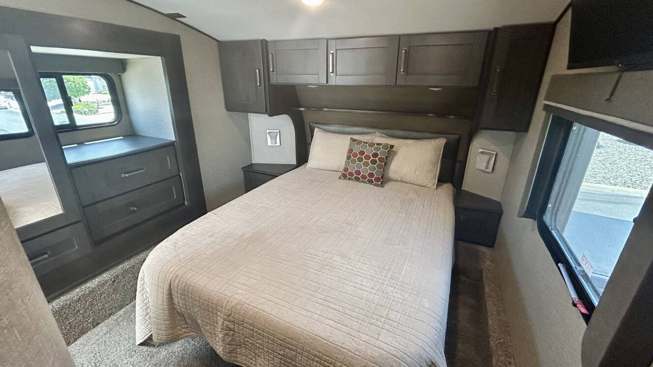 A photo of this 2021 Grand Design REFLECTION 303RLS