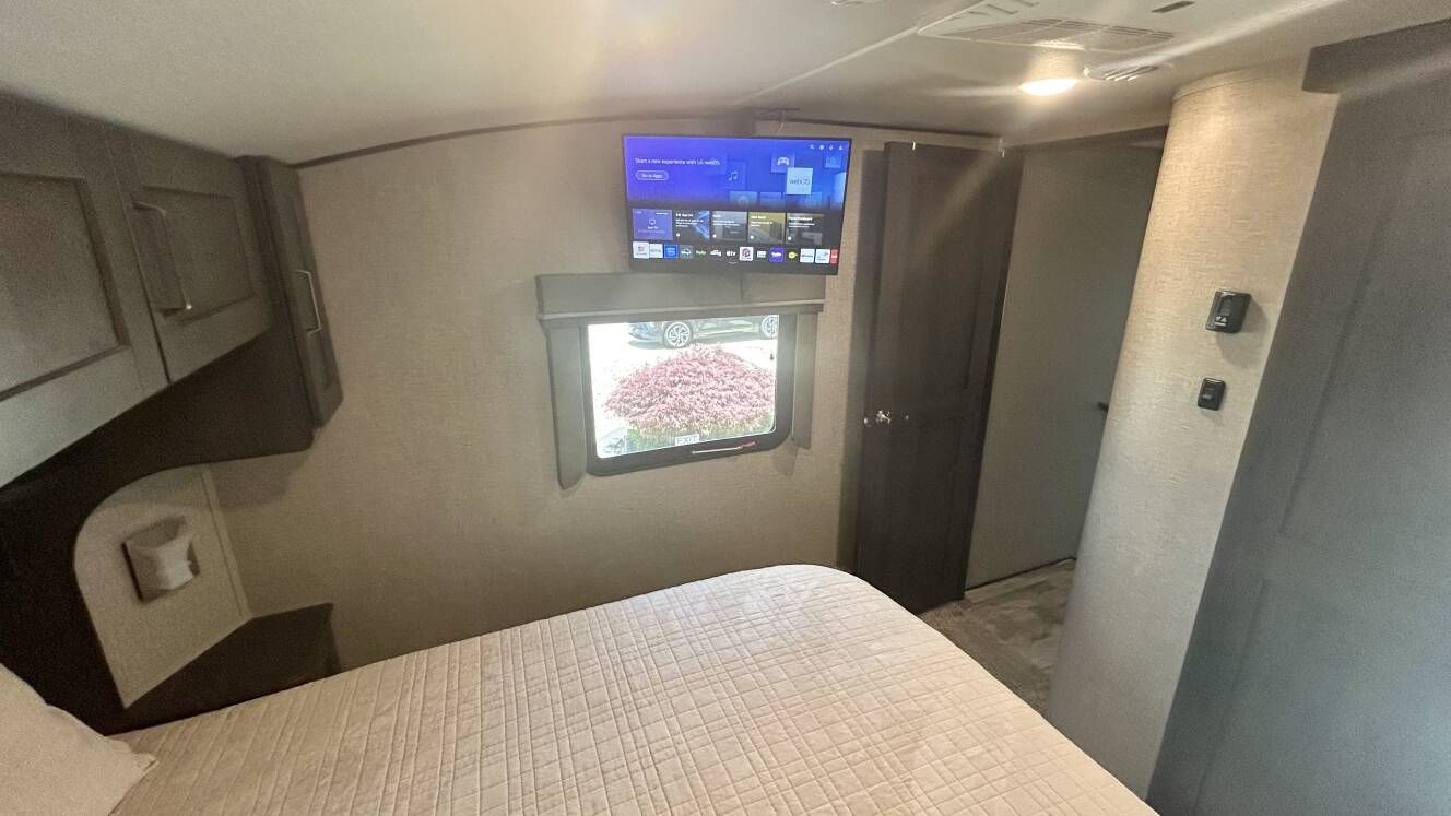 A photo of this 2021 Grand Design REFLECTION 303RLS