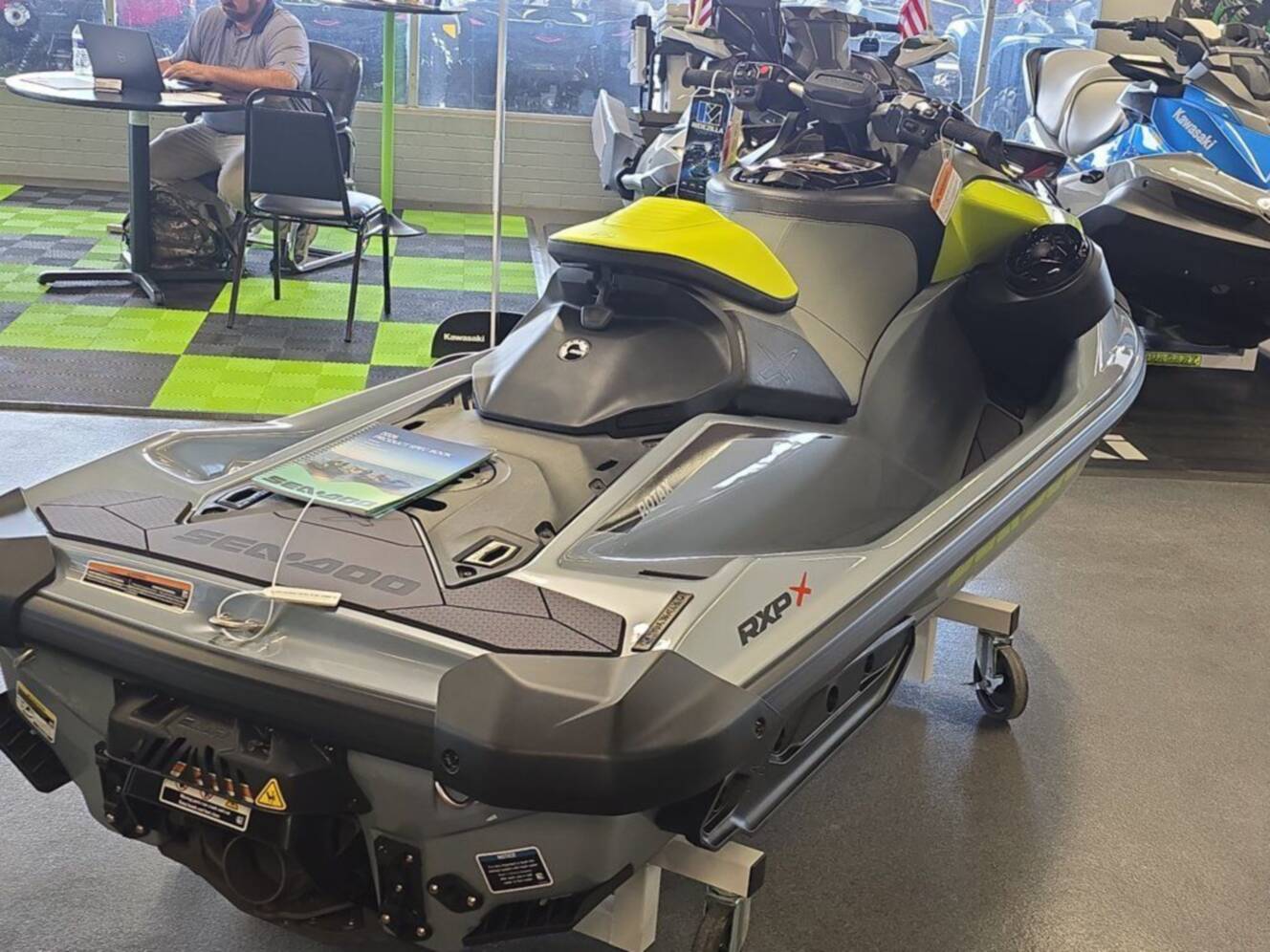 A photo of this 2026 Sea-Doo RXP-X 325 Tech, BRP Premium A, iBR Ice Metal / Manta
