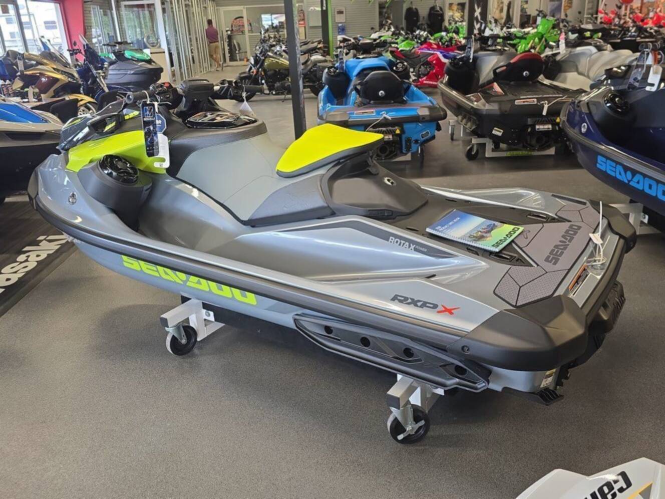 A photo of this 2026 Sea-Doo RXP-X 325 Tech, BRP Premium A, iBR Ice Metal / Manta