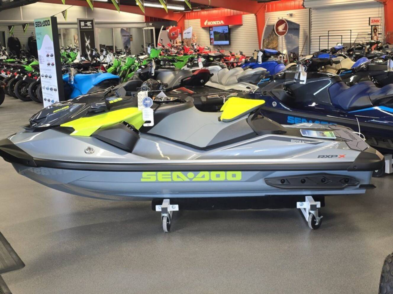 A photo of this 2026 Sea-Doo RXP-X 325 Tech, BRP Premium A, iBR Ice Metal / Manta