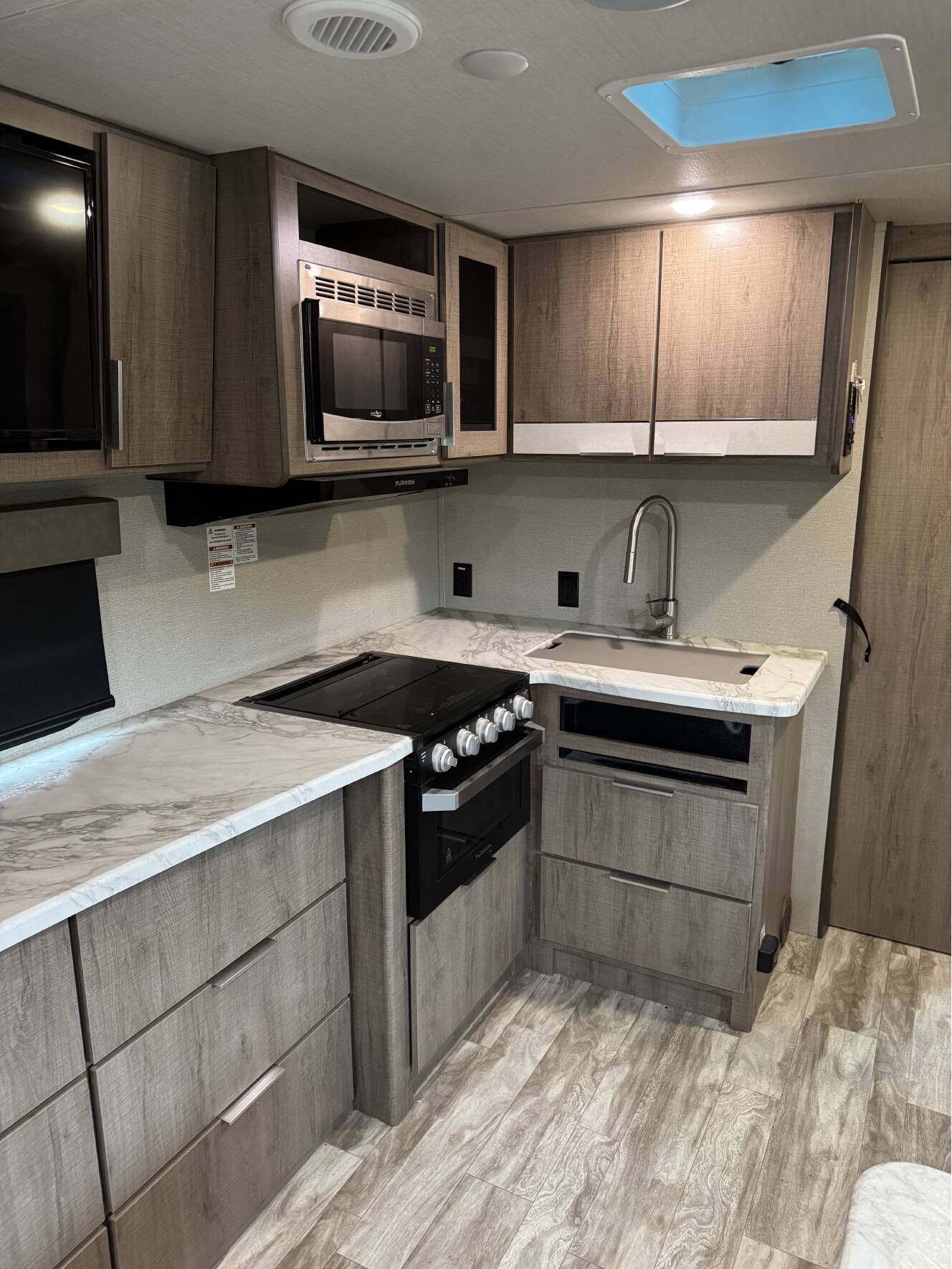 A photo of this 2020 Grand Design IMAGINE XLS 22RBE