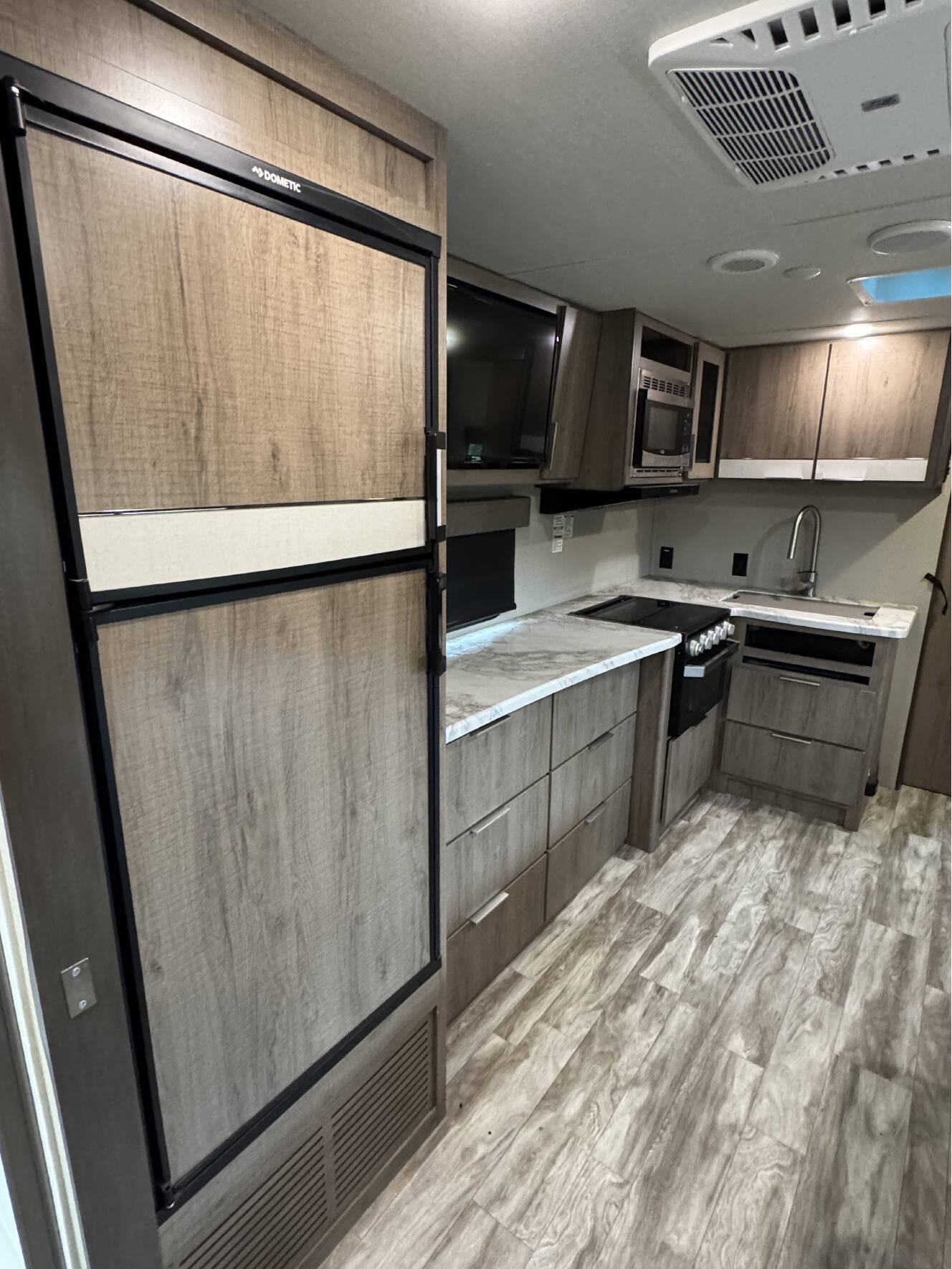 A photo of this 2020 Grand Design IMAGINE XLS 22RBE