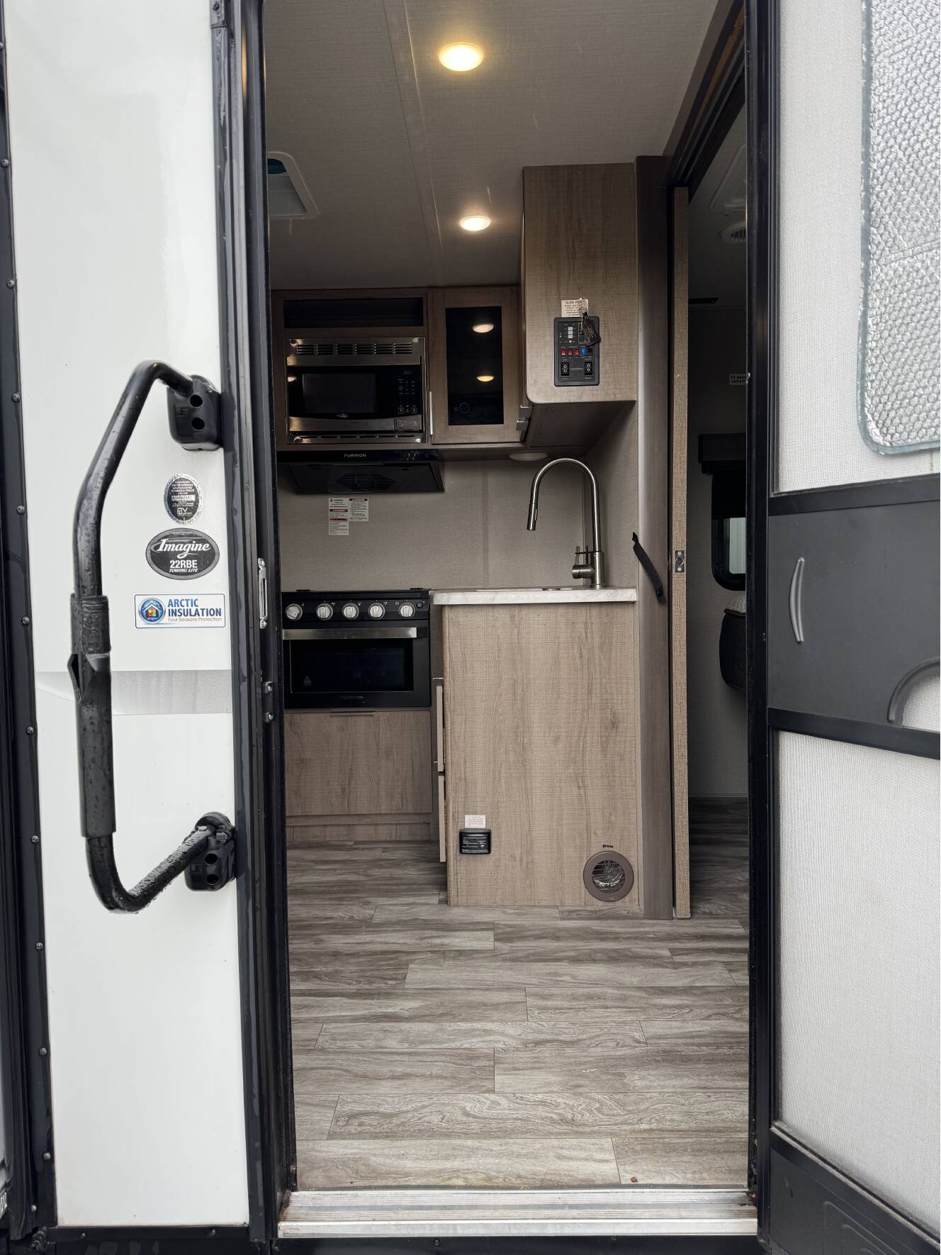 A photo of this 2020 Grand Design IMAGINE XLS 22RBE